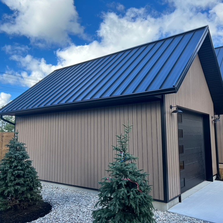 port elgin home with vinyl siding and new gutters