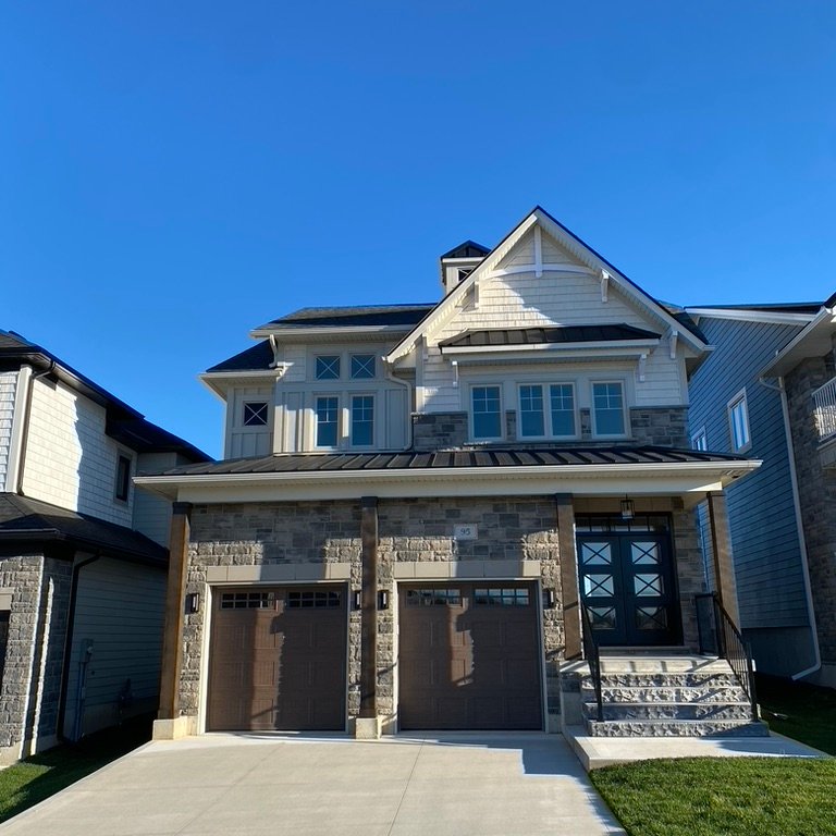 port elgin home with vinyl siding and new gutters