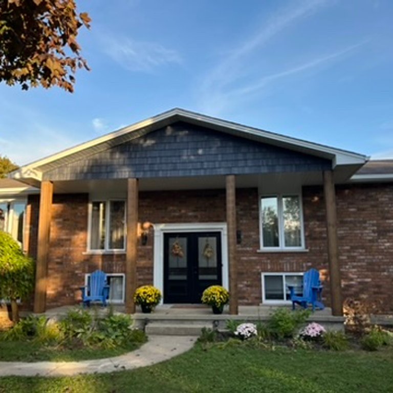 port elgin home with vinyl siding and new gutters