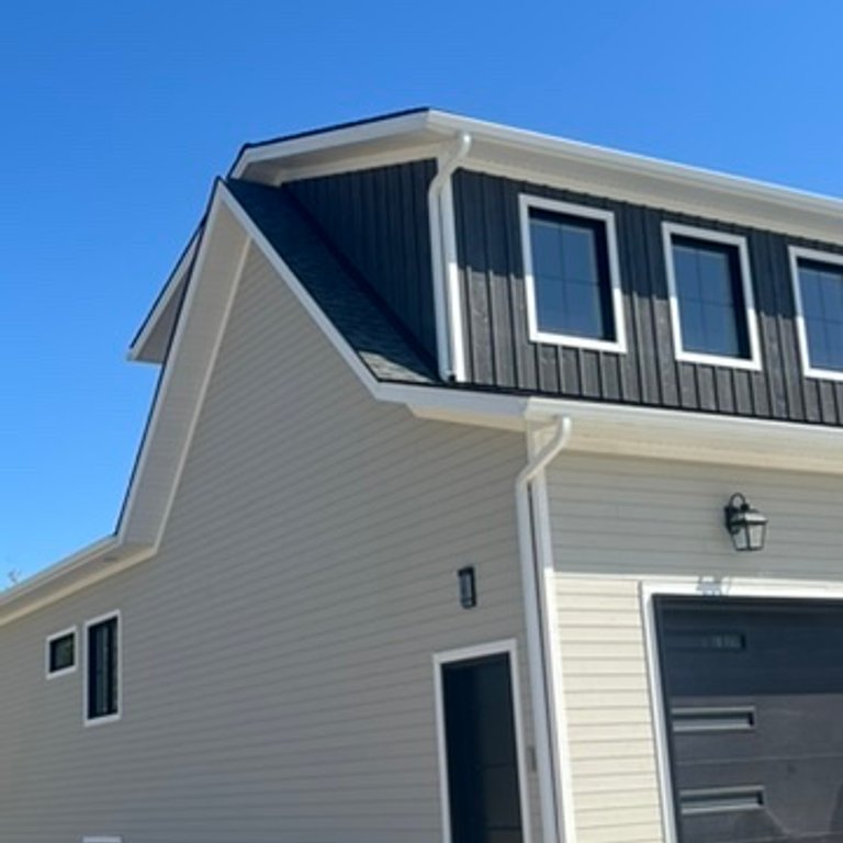 port elgin home with vinyl siding and new gutters