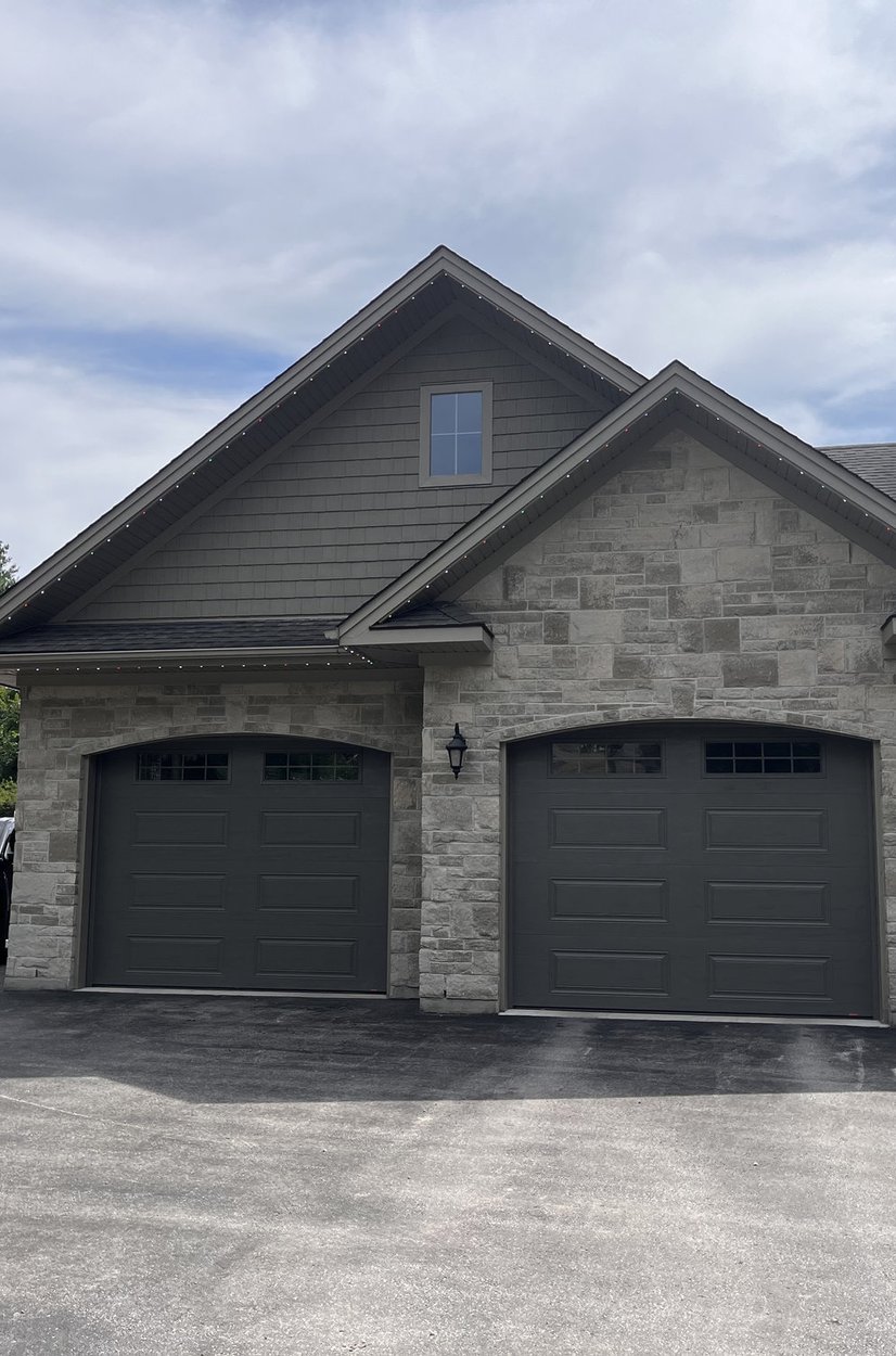 Year-round outdoor lighting on a Bruce County home at night