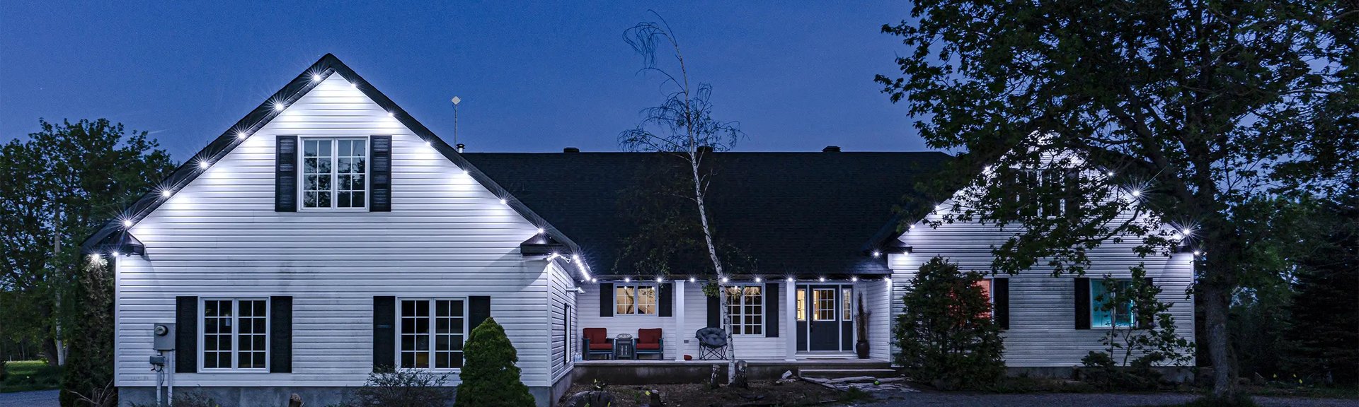 House with vinyl siding and gutters