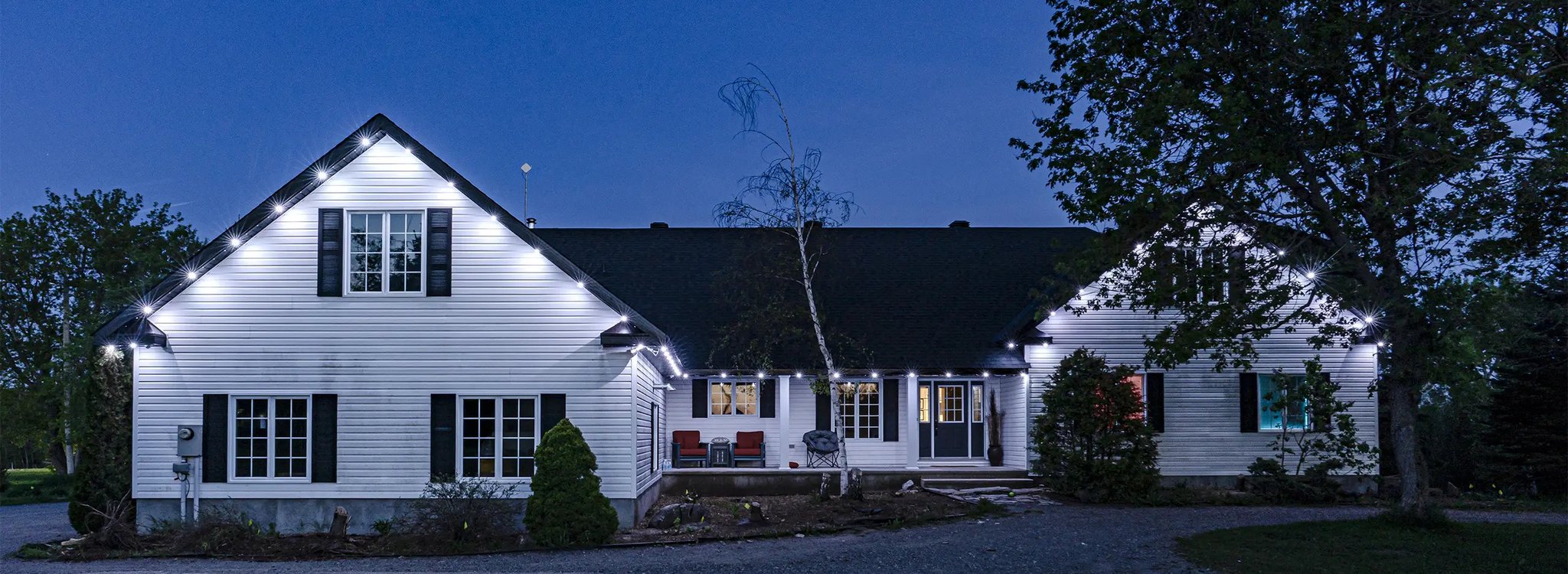 House with vinyl siding and gutters