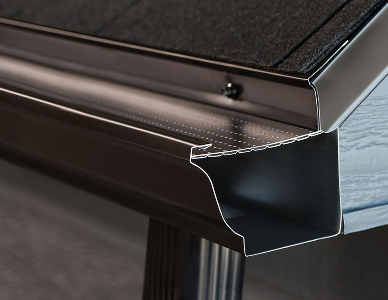 Gutter guard system close-up used by Olive Tree Exteriors